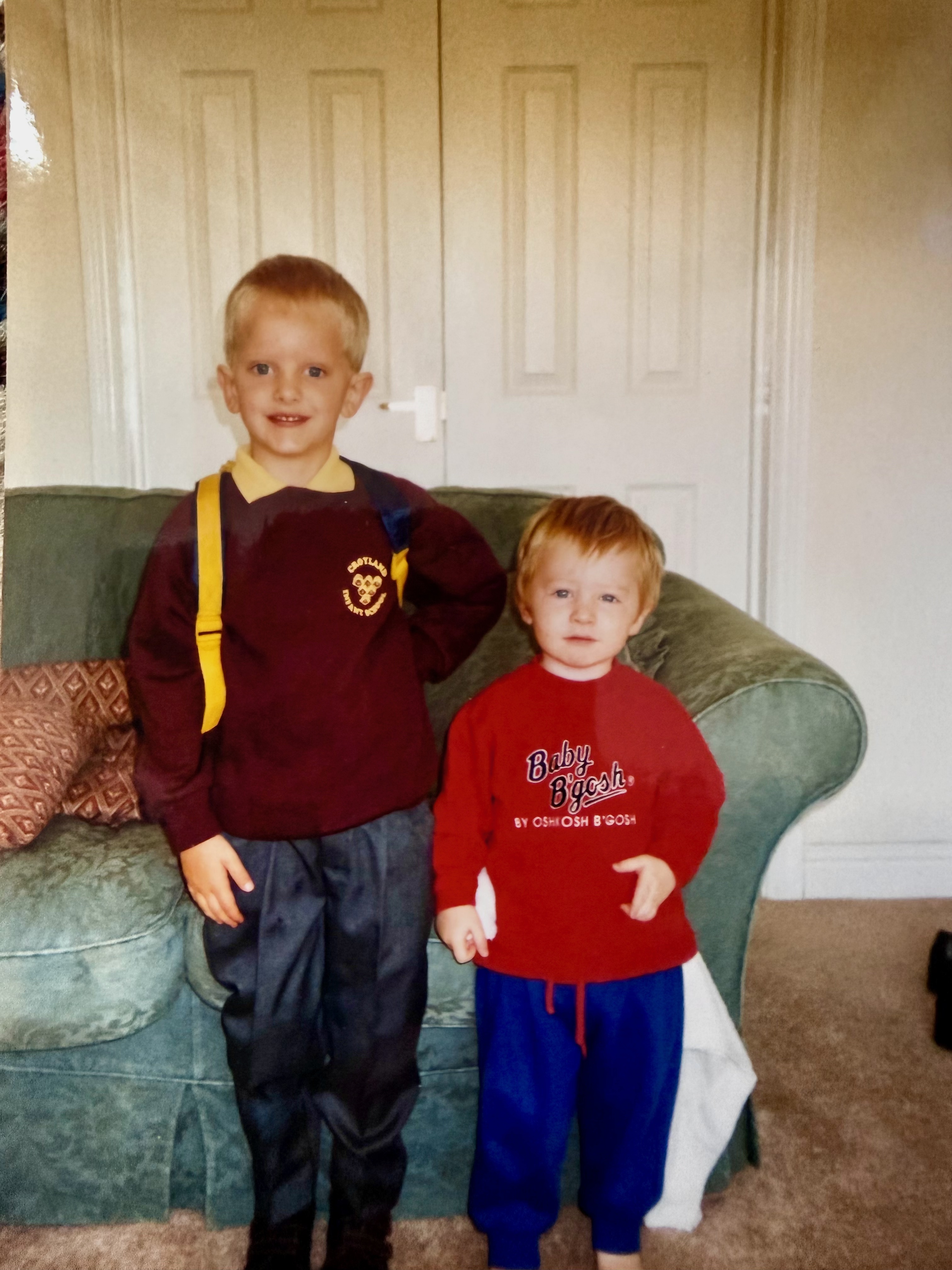 Sam as a child in his school uniform